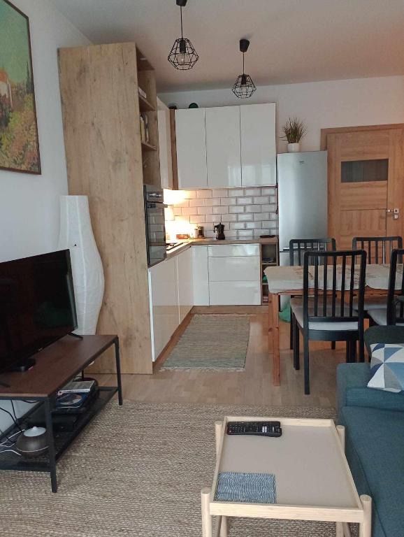 Pokoje nad Radunią - Taras, parter, hotel blisko dworca Pruszcz Gdański